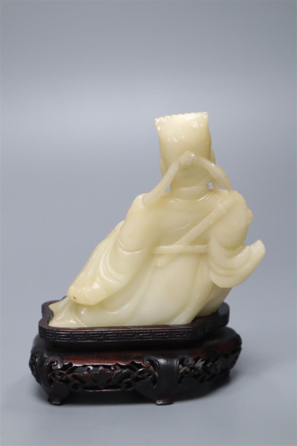 A Chinese soapstone figure of a Star God, wood stand, overall height 14cm